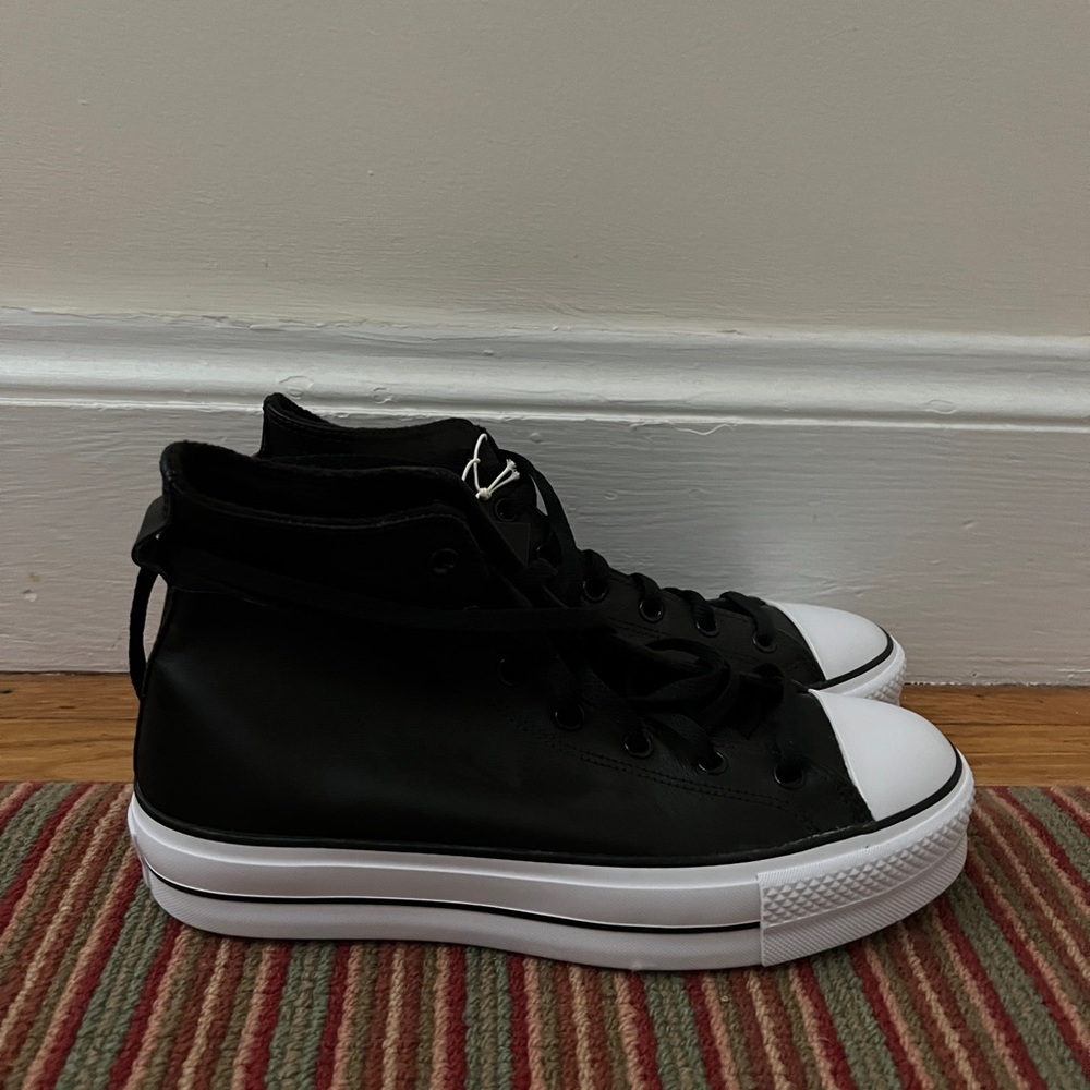 Converse Black High-Top Sneakers with White Toe Cap and Sole